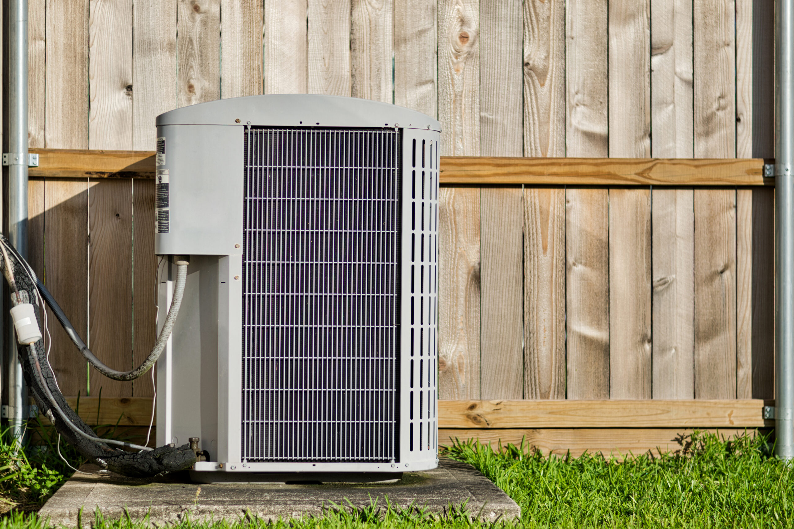 Newly installed AC unit outside a Michigan home